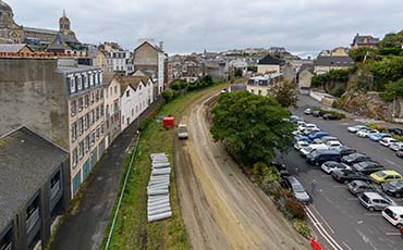 Première étape du chantier de la voie douce : le rabotage de la rue du Boscq, crédit: B. Croisy - coll. Ville de Granville